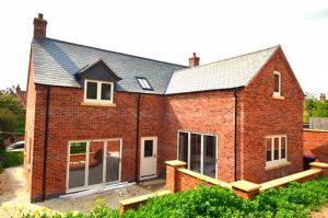 Rear Elevation- click for photo gallery